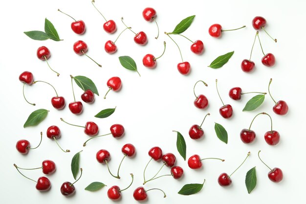 Sweet red cherry berries on white background