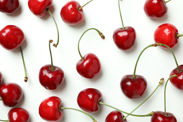 Sweet red cherry berries on white background