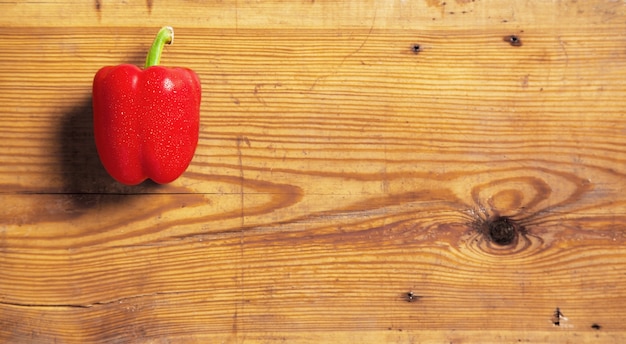 Sweet red peppers on a cutting board