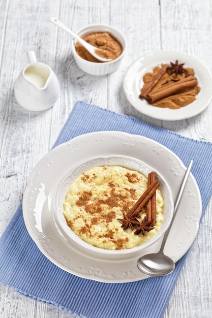 Sweet rice pudding with cinnamon and anise star