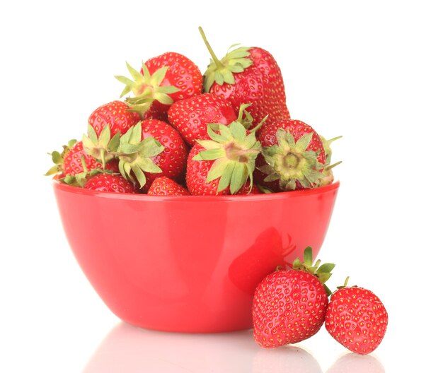 Sweet ripe strawberries in bowl isolated on white