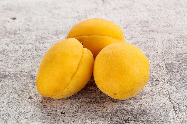 Sweet ripe tasty apricot heap isolated