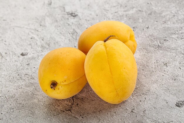 Sweet ripe tasty apricot heap isolated