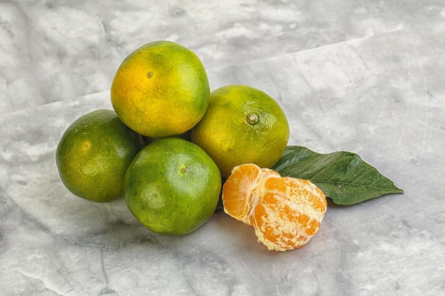 Sweet ripe and tasty green mandarin heap