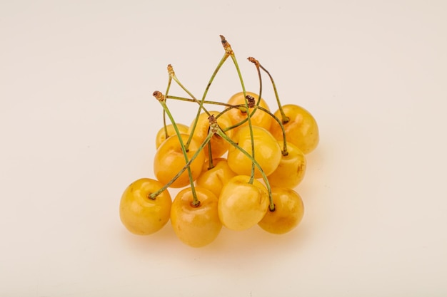 Sweet ripe yellow cherry heap