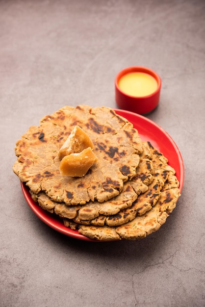 Sweet roti made out of rice flour jaggery and ghee Gud ki roti gur ki roti jaggery Bhakri meethi gud ki roti Winter food Copy space