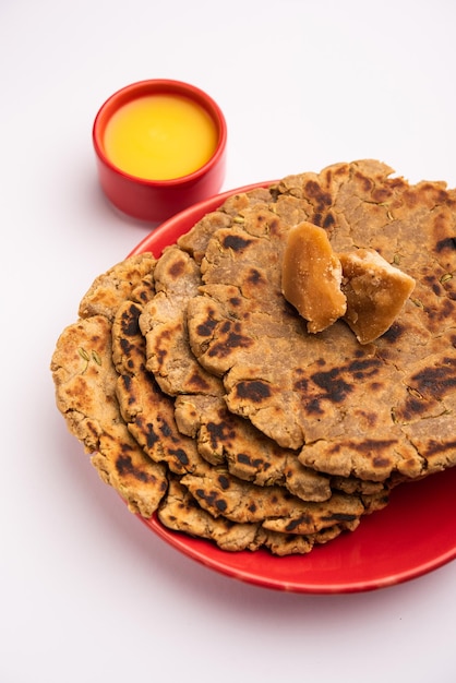 Sweet roti made out of rice flour jaggery and ghee Gud ki roti gur ki roti jaggery Bhakri meethi gud ki roti Winter food Copy space