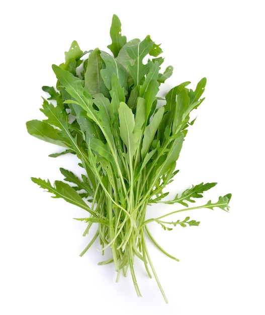 Sweet rucola salad or rocket lettuce leaves isolated on white background