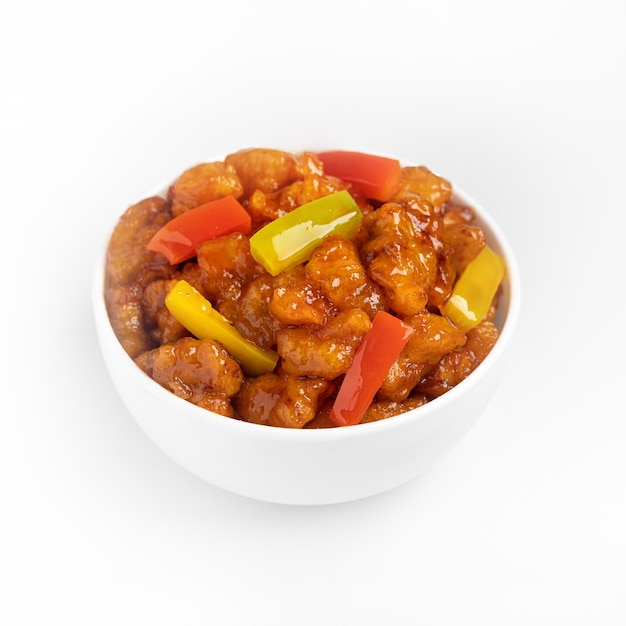 Sweet and sour pork chinese cuisine dish on a white background