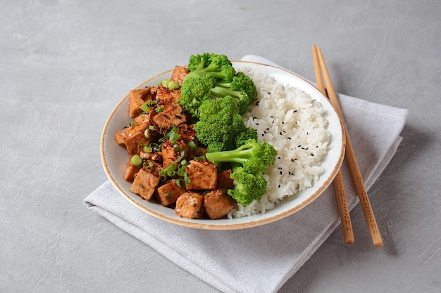 Sweet, spicy , crispy and fried Tofu in teriyaki sauce served with rice.