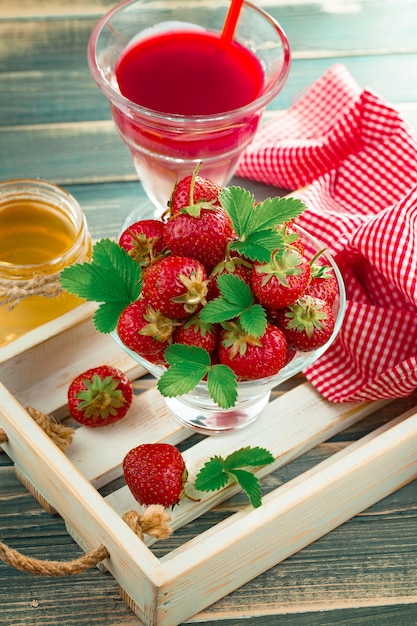 Sweet strawberry and healthy smoothies on the table.