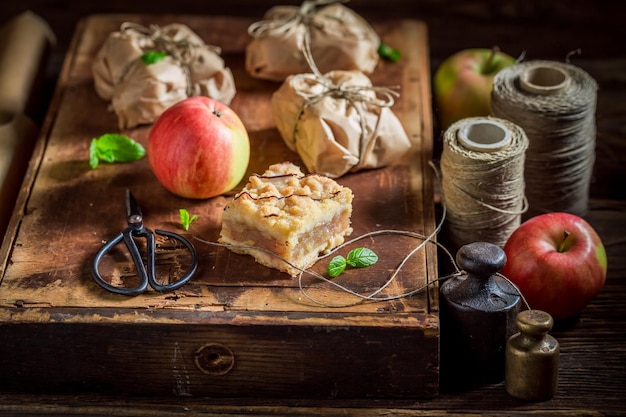 Sweet take away apple pie with crumble and icing