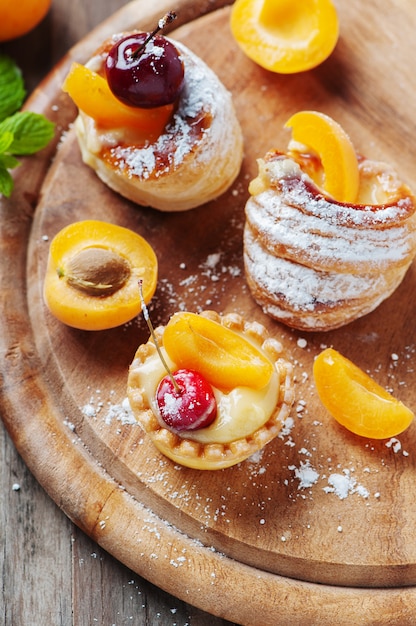 Sweet tarts with cherry and apricot