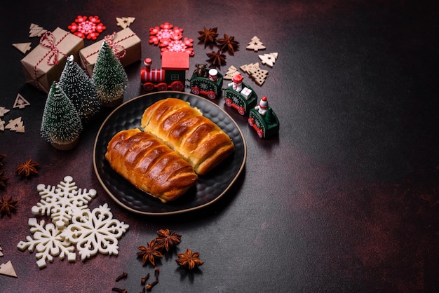 Sweet tasty fresh festive baking on a dark concrete background