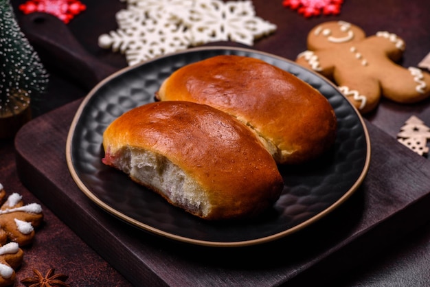 Sweet tasty fresh festive baking on a dark concrete background