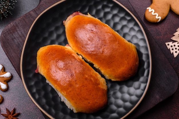 Sweet tasty fresh festive baking on a dark concrete background