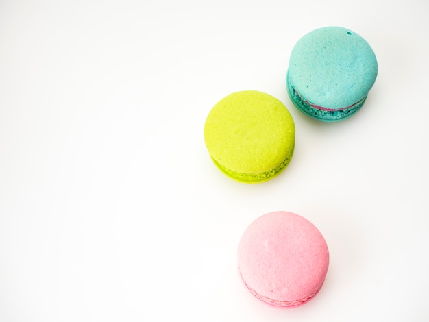 Sweet three macarons love on white 