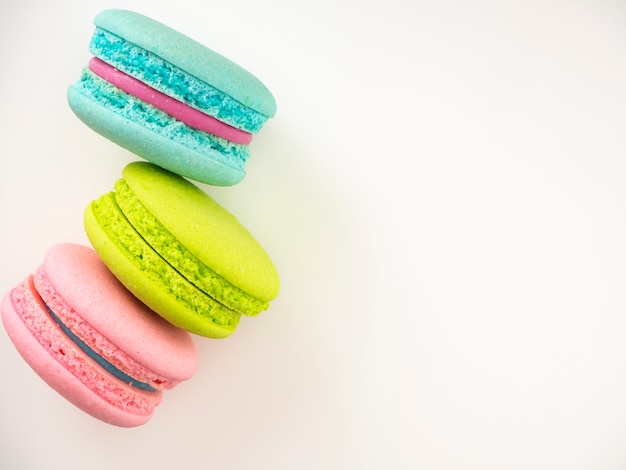 Sweet three macarons love on white 