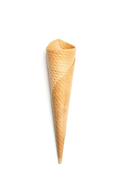 Sweet vanilla wafer cone isolated on a white background