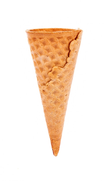 Photo sweet wafer cone isolated on white surface