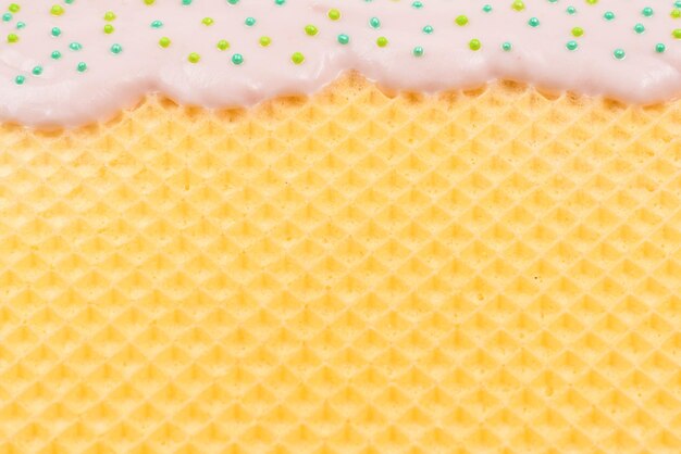 Sweet waffle background with cream