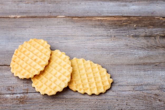 Sweet waffle on a  wooden background