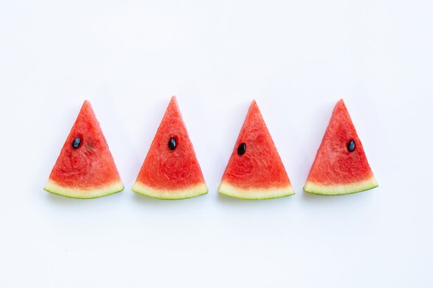 Sweet watermelon slices on white background