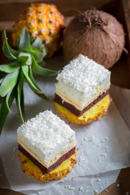 Sweet white cake made of cocoa biscuit and pineapple