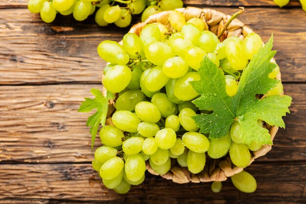 Sweet yellow grape with leaves