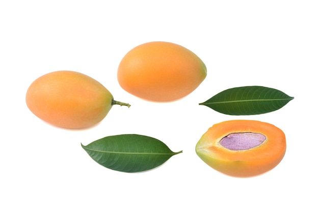 Sweet Yellow Marian plum with leaves isolated on white background