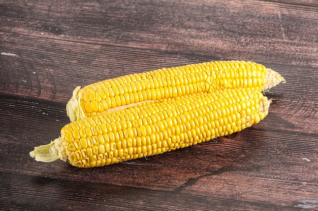 Sweet yellow raw ripe corn cob