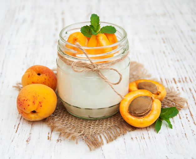 Sweet yogurt with fresh apricots