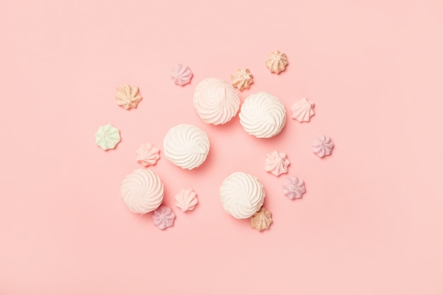 Premium Photo | Sweets on a pastel pink surface