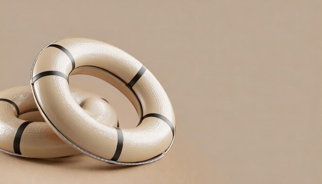 Swim rings on beige background with copy space