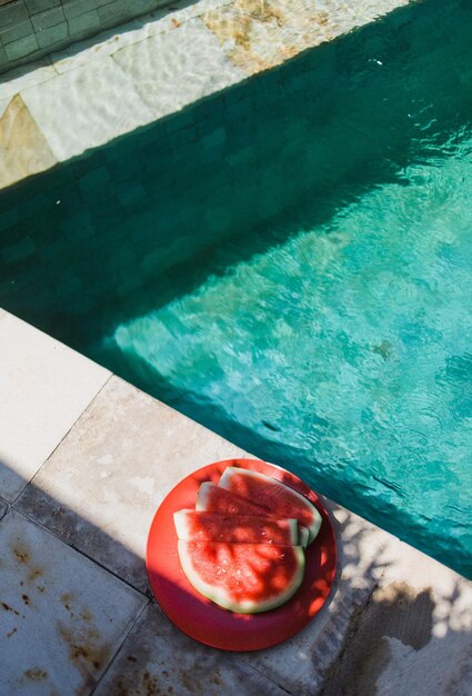 Photo swiming pool watermelon plate summer vacation