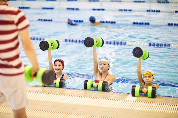 Swimming class training with coach