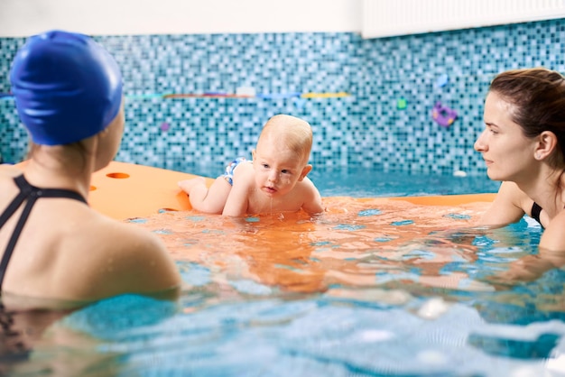 Swimming class with instructor for infants