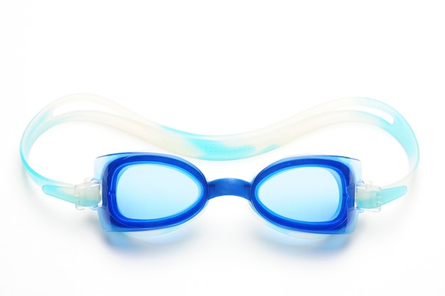Swimming goggles on white