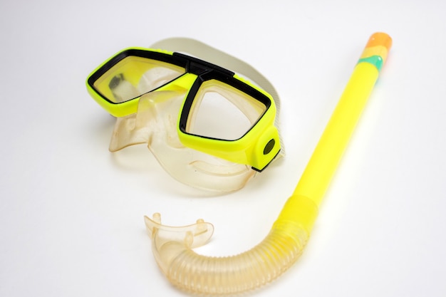 Photo swimming mask and snorkel on white background. diving mask