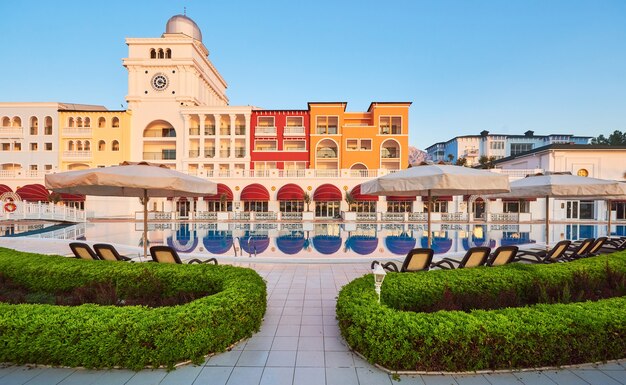 Swimming pool and beach of luxury hotel.