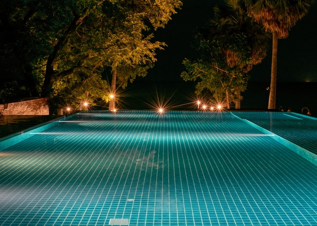 Swimming pool blue at night have light