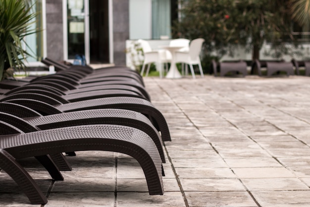 Swimming pool chairs on hotel