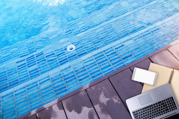 swimming pool and terrace with step down to the pool