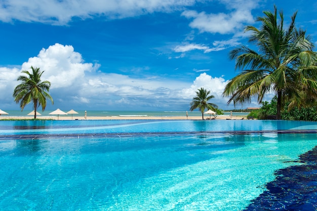 Swimming pool in a tropical beach