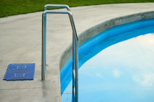 Swimming pool with clear water and stairs