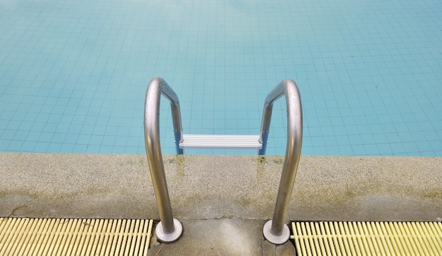 Swimming pool with stair at hotel in Thailand