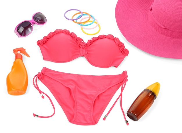 Swimsuit and beach items isolated on white