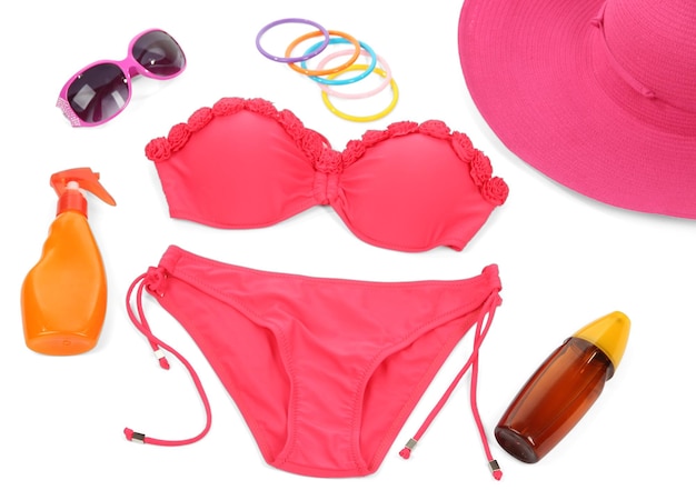 Photo swimsuit and beach items isolated on white