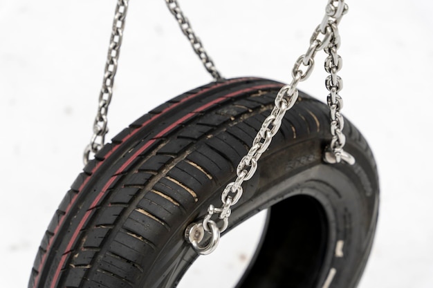 Swing made of car tires and chains A children39s playground