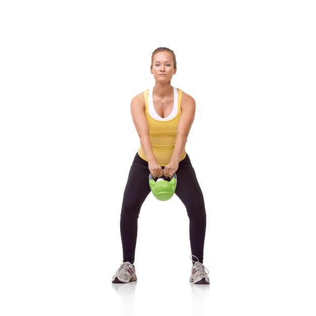 Swinging her kettlebell